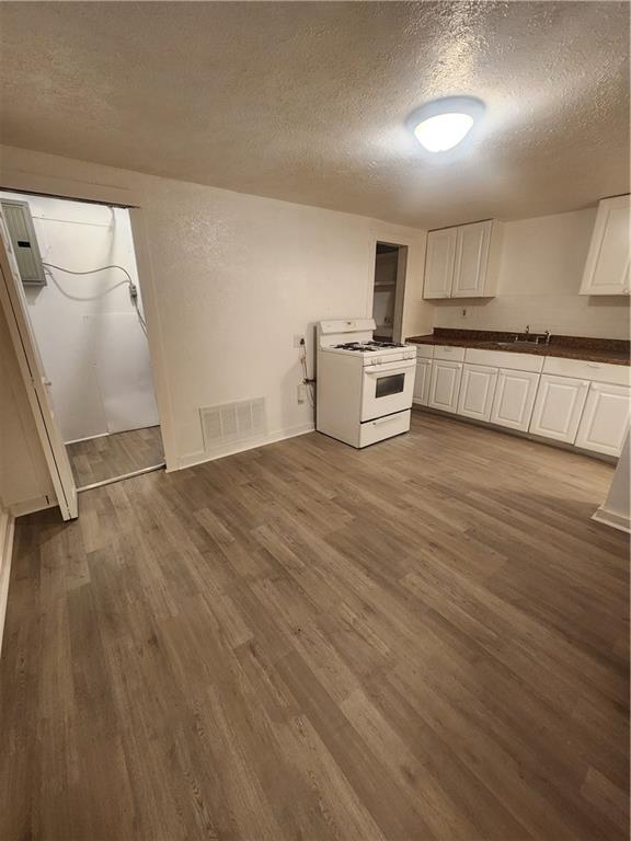 709 Camp Street McKees Rocks, PA 15136 - Photo 3 of 9 a view of kitchen with microwave and cabinets