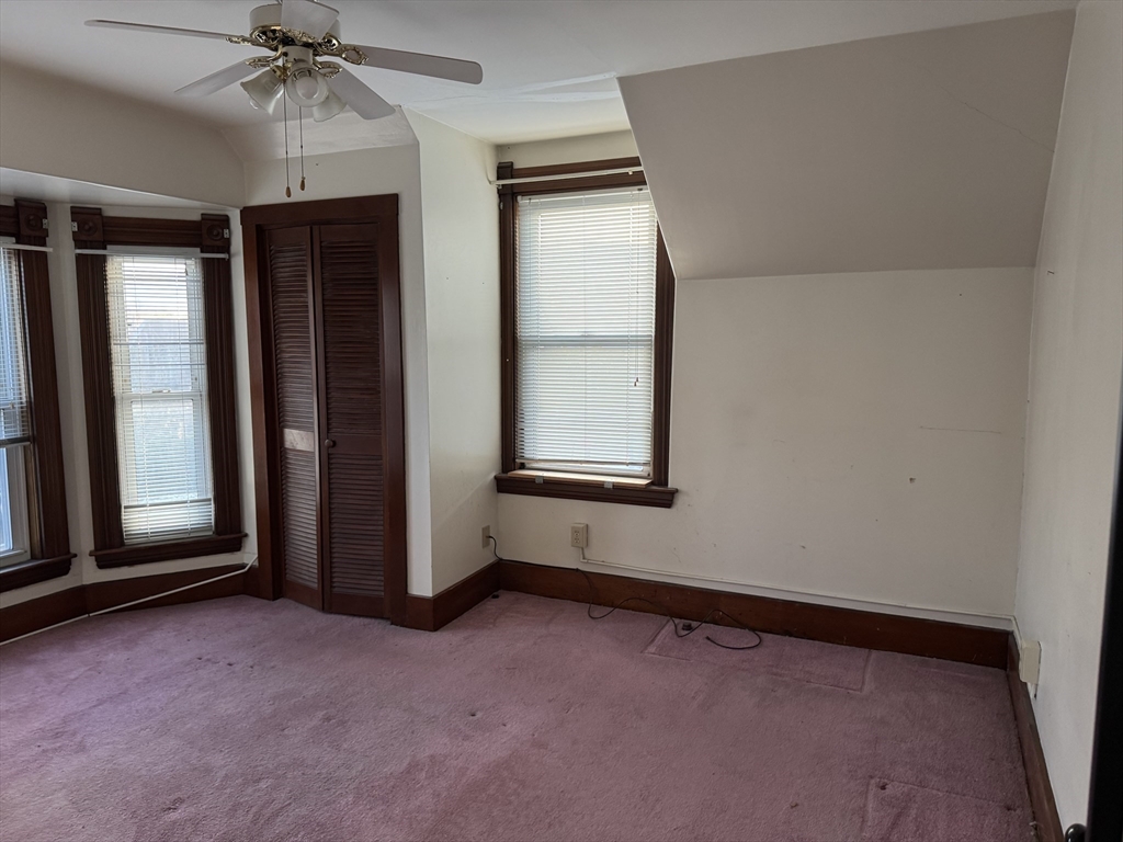 93 Cross Street Gardner, MA 01440 - Photo 25 of 35 an empty room with windows and closet