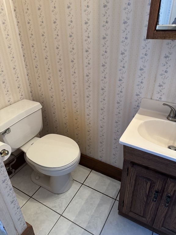 93 Cross Street Gardner, MA 01440 - Photo 29 of 35 a bathroom with a sink and a toilet