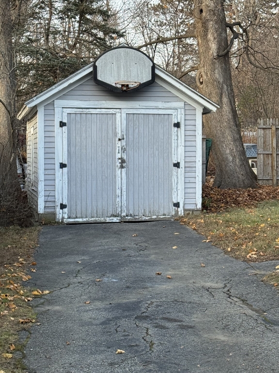 93 Cross Street Gardner, MA 01440 - Photo 4 of 35 a backyard of a house