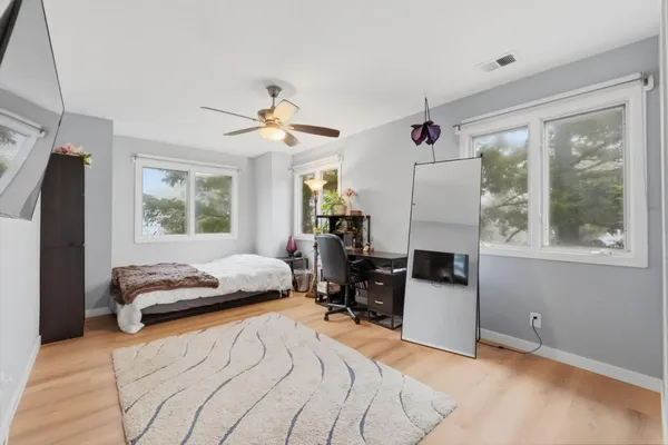 a view of a livingroom with a furniture and a window