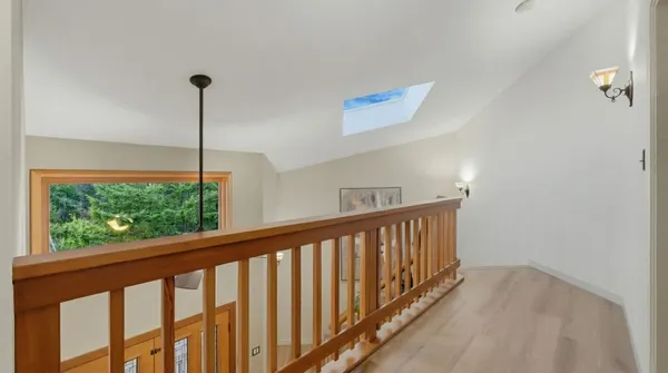 a view of a bedroom from a hallway