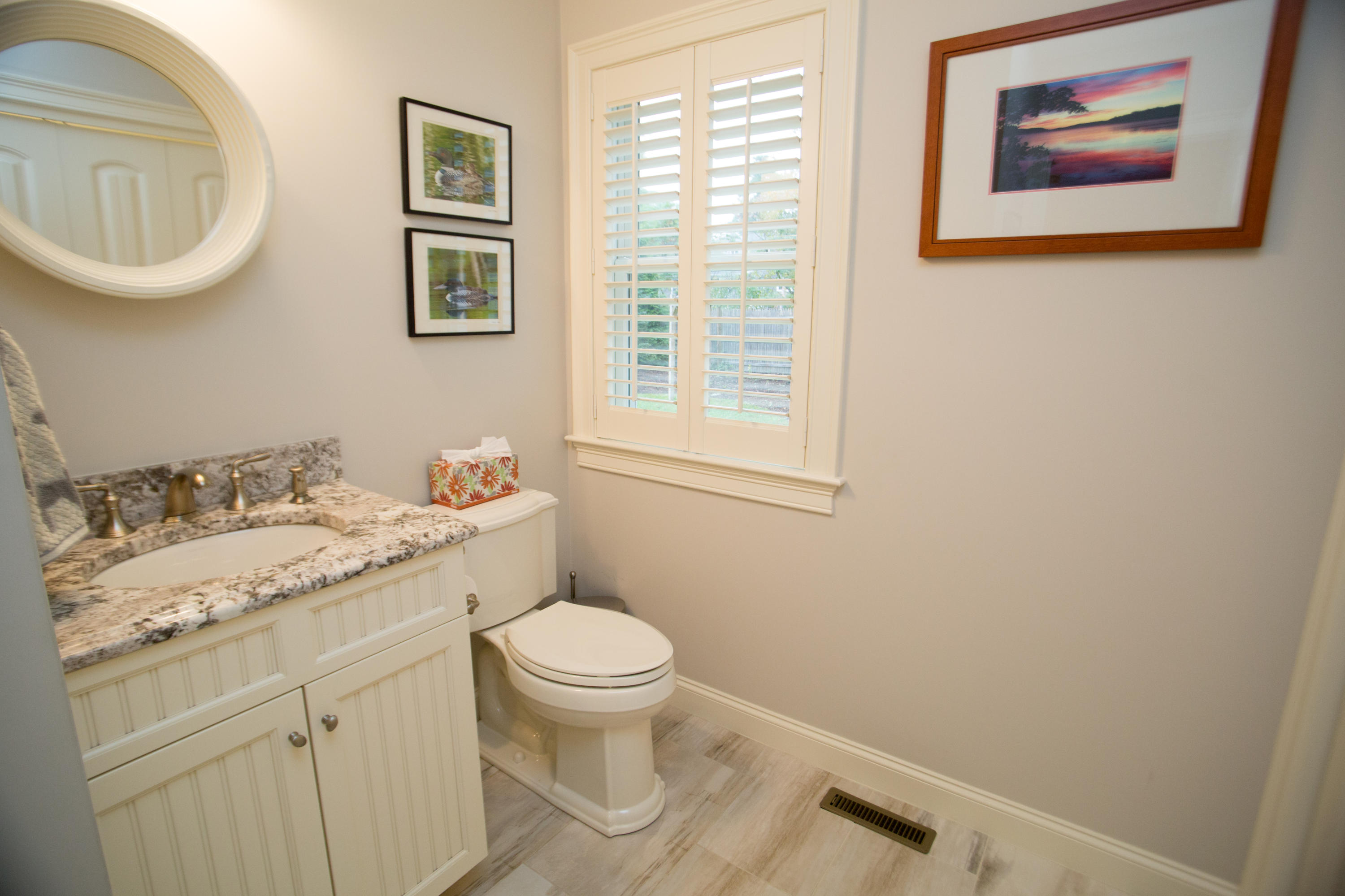 15 Center Lane Centerville, MA 02632 - Photo 11 of 36 a bathroom with a granite countertop toilet and a sink