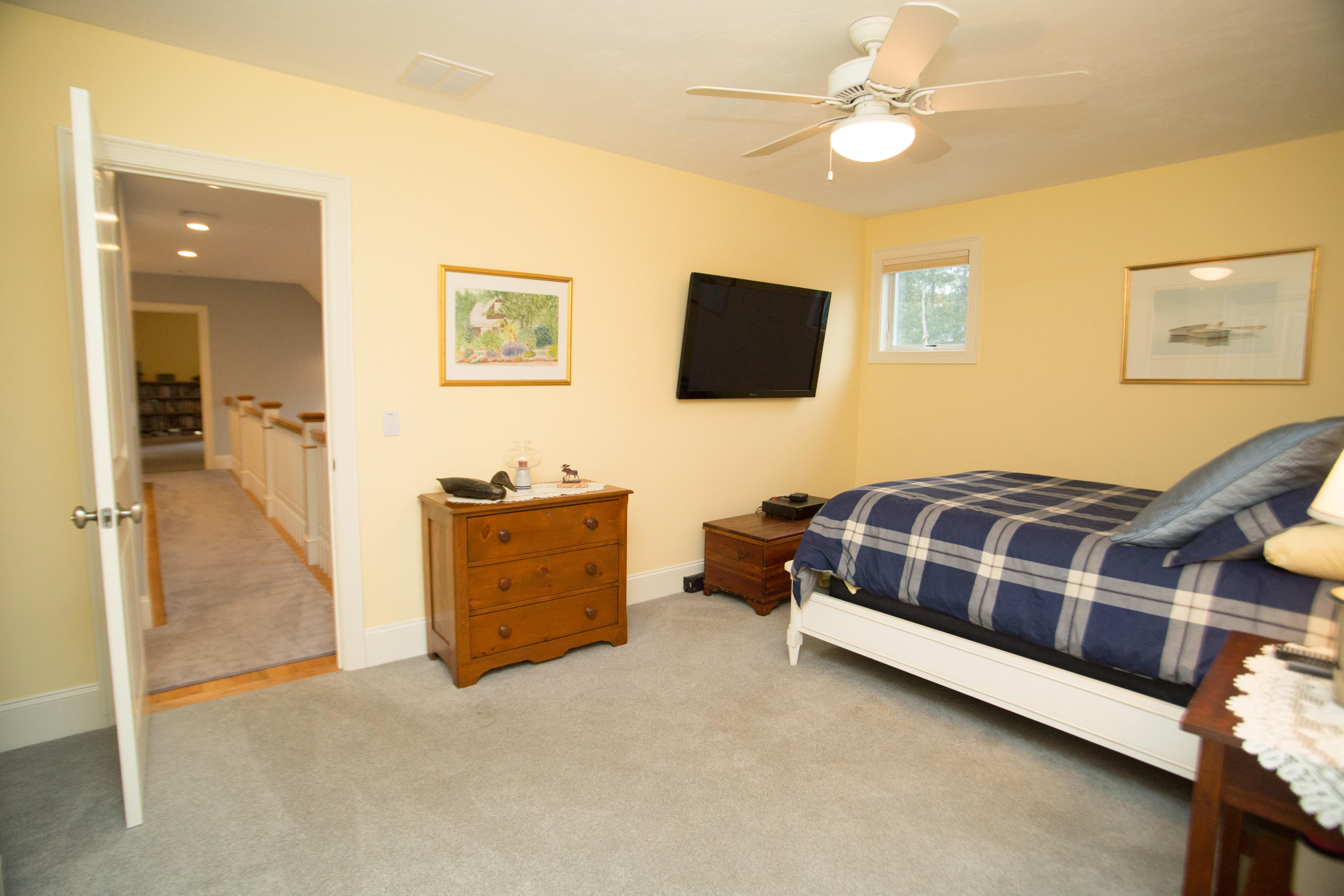 15 Center Lane Centerville, MA 02632 - Photo 21 of 36 a bedroom with a bed and a flat screen tv