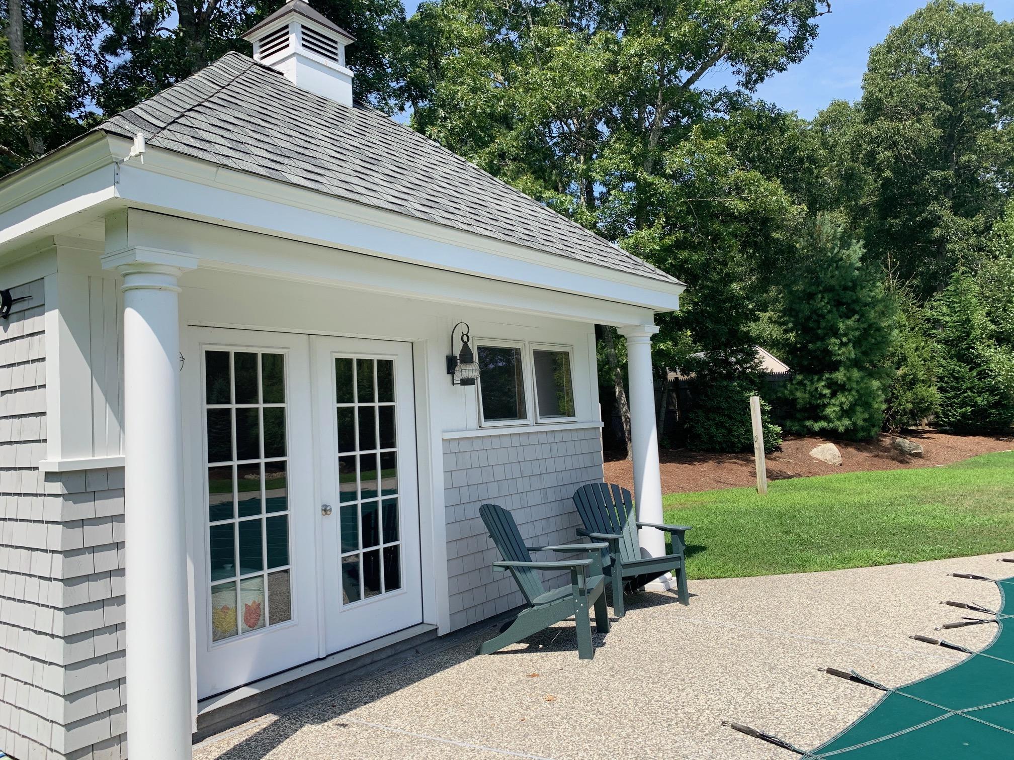 15 Center Lane Centerville, MA 02632 - Photo 28 of 36 a front view of a house with garden