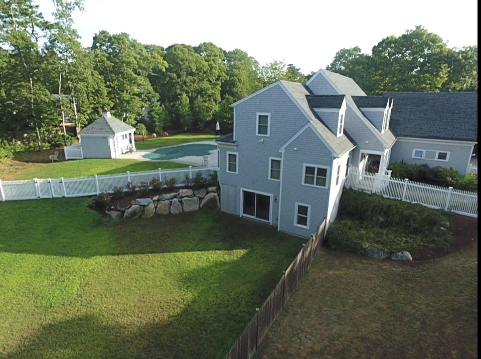 15 Center Lane Centerville, MA 02632 - Photo 35 of 36 a aerial view of a house with a yard