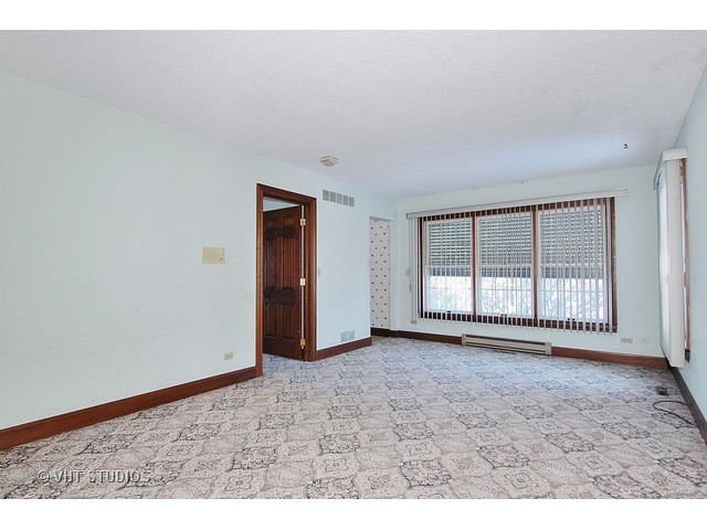 19N310 Boyer Road Algonquin, IL 60102 - Photo 9 of 25 a view of an empty room with a window