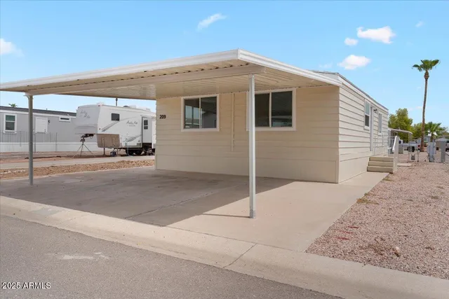 a front view of a house with a outdoor space