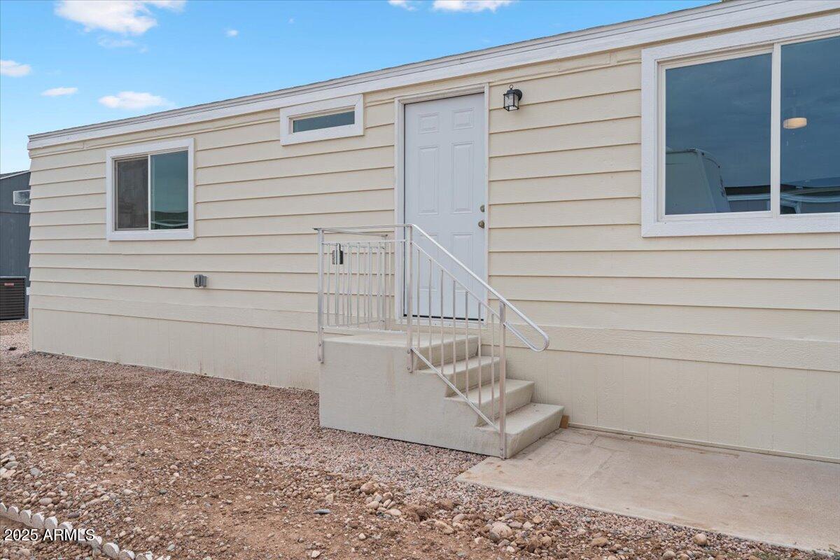 320 East McKellips Road, Unit 209 Mesa, AZ 85201 - Photo 6 of 25 a view of front door of house