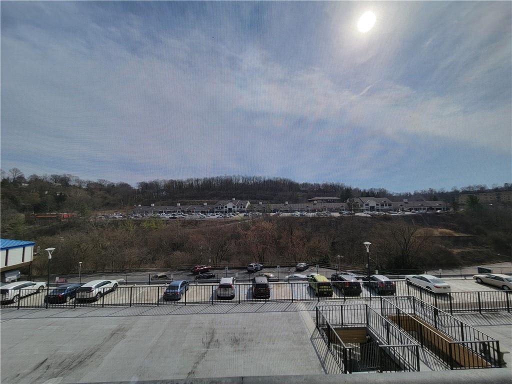 2120 Greentree Road, Unit 100E Pittsburgh, PA 15220 - Photo 19 of 25 a view of a lake with outdoor seating