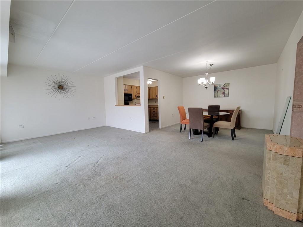 2120 Greentree Road, Unit 100E Pittsburgh, PA 15220 - Photo 2 of 25 a view of a livingroom with furniture and furniture
