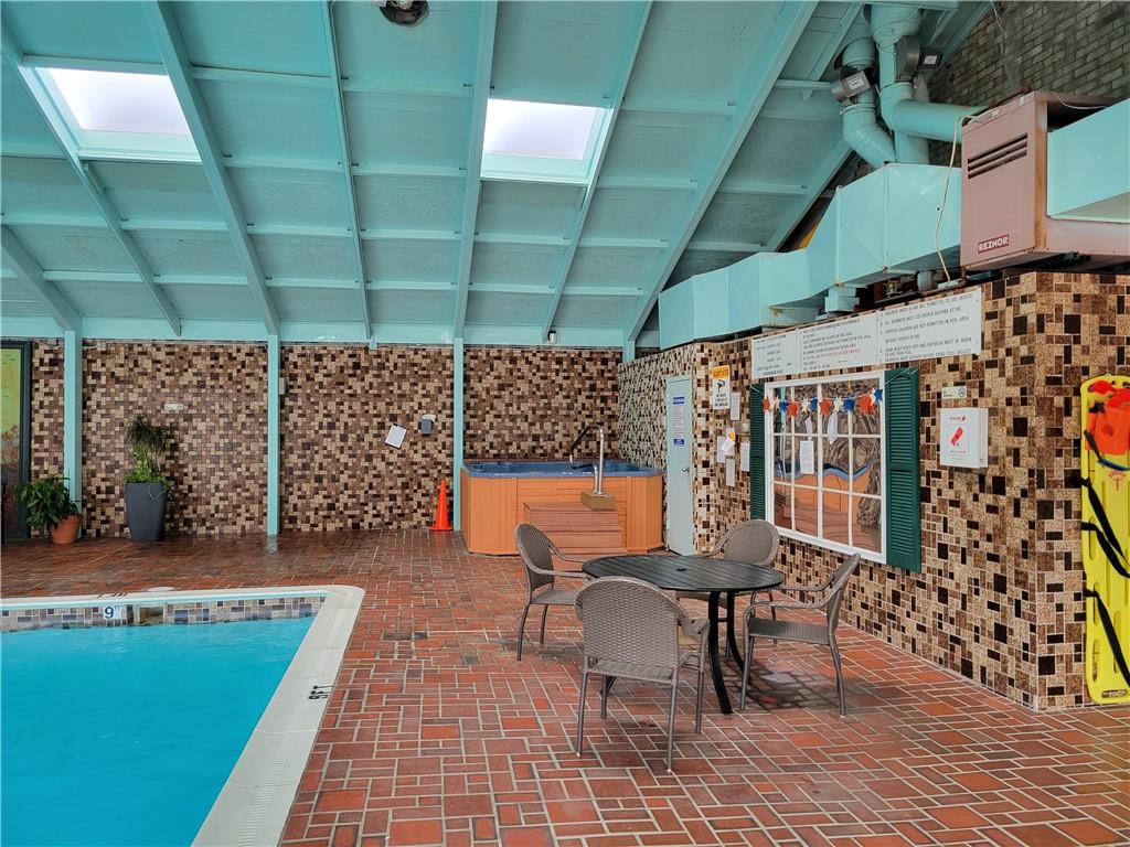 2120 Greentree Road, Unit 100E Pittsburgh, PA 15220 - Photo 22 of 25 a view of a chairs and table in the patio