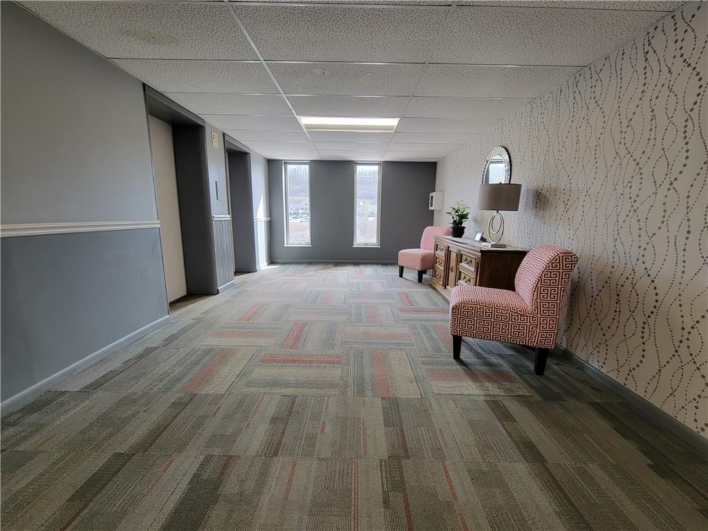 2120 Greentree Road, Unit 100E Pittsburgh, PA 15220 - Photo 24 of 25 a living room with furniture and a wooden floor