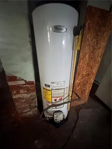 a view of an entryway with a floor to ceiling window