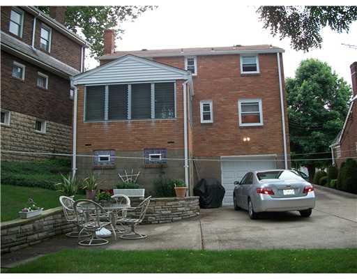 234 Hornaday Road Carrick, PA 15210 - Photo 18 of 18 Exterior Front. CHECK OUT THE BEAUTIFUL STONE WALL AND CONCRETE PATIO !