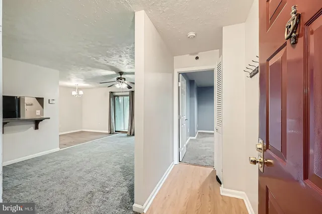 a view of a hallway view with natural light