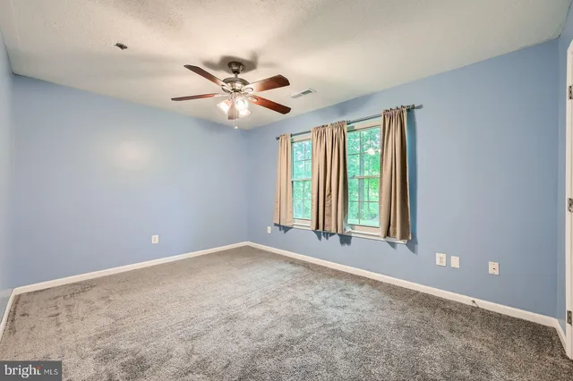 a bathroom with a sink a toilet and a bathtub