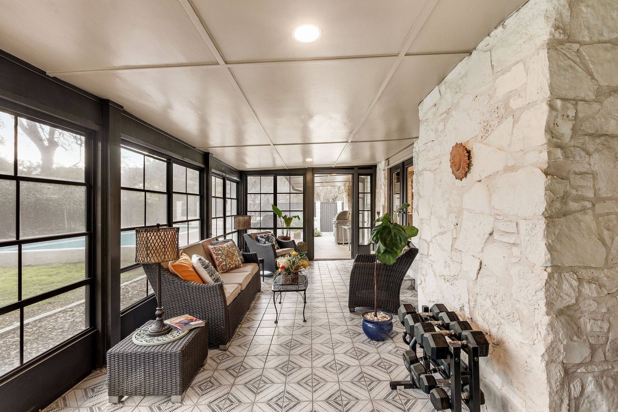 2505 Side Cove Austin, TX 78704 - Photo 29 of 40 Screen porch off the kitchen and dining room, with entry into primary suite