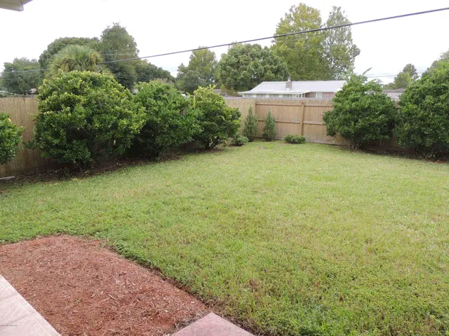 a garden view with a seating space
