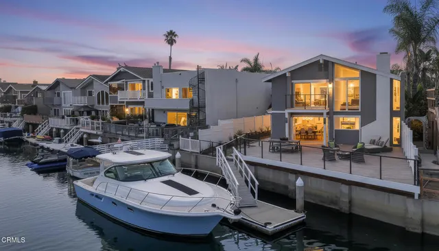 a front view of house with outdoor seating