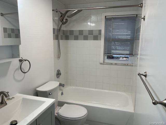 69 Juniper Road Port Washington, NY 11050 - Photo 4 of 4 a bathroom with a bathtub shower sink vanity and toilet