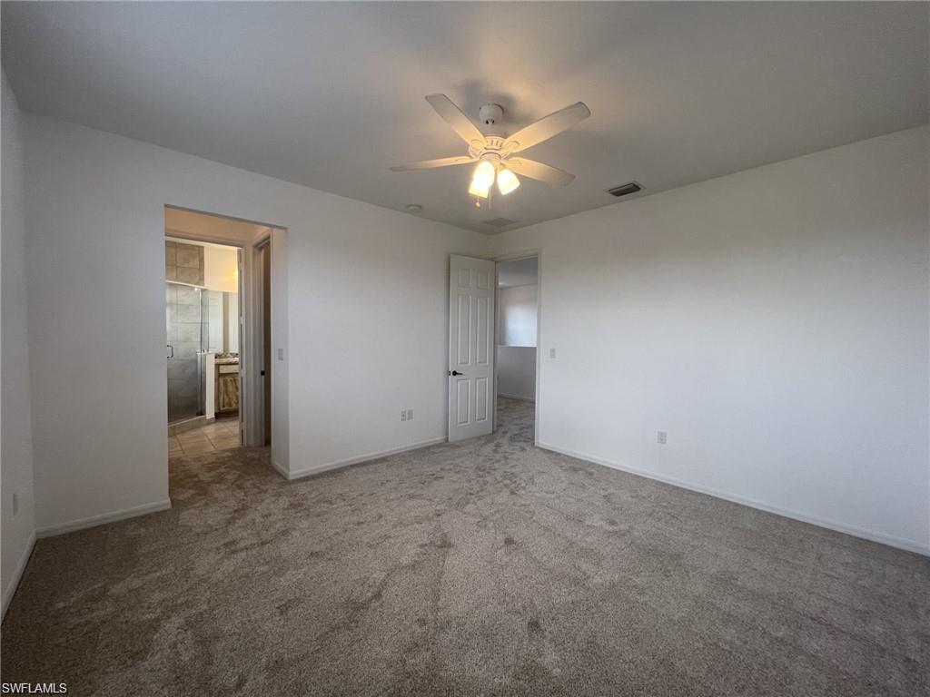 5459 Useppa Drive Ave Maria, FL 34142 - Photo 6 of 27 an empty room with a bathroom