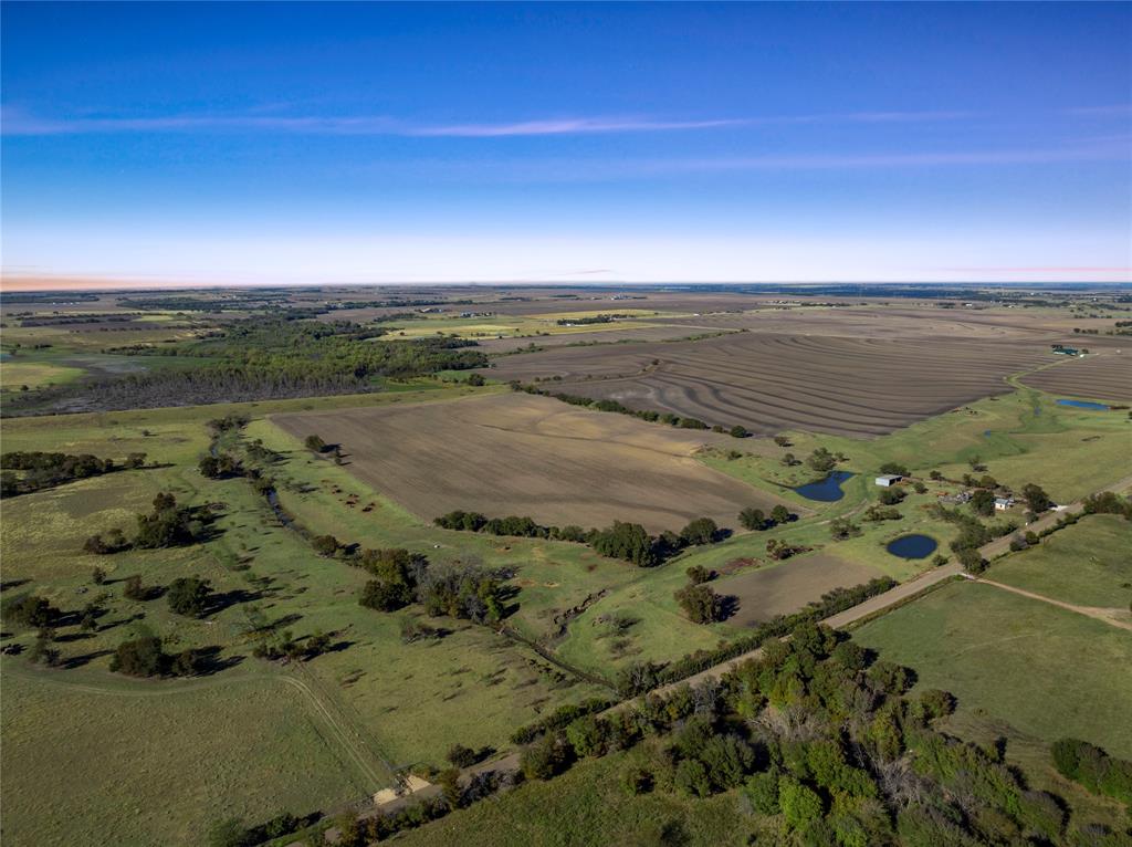 2663 West Crabb Road West, TX 76691 - Photo 3 of 22 Aerial overview of property's location with rural landscape