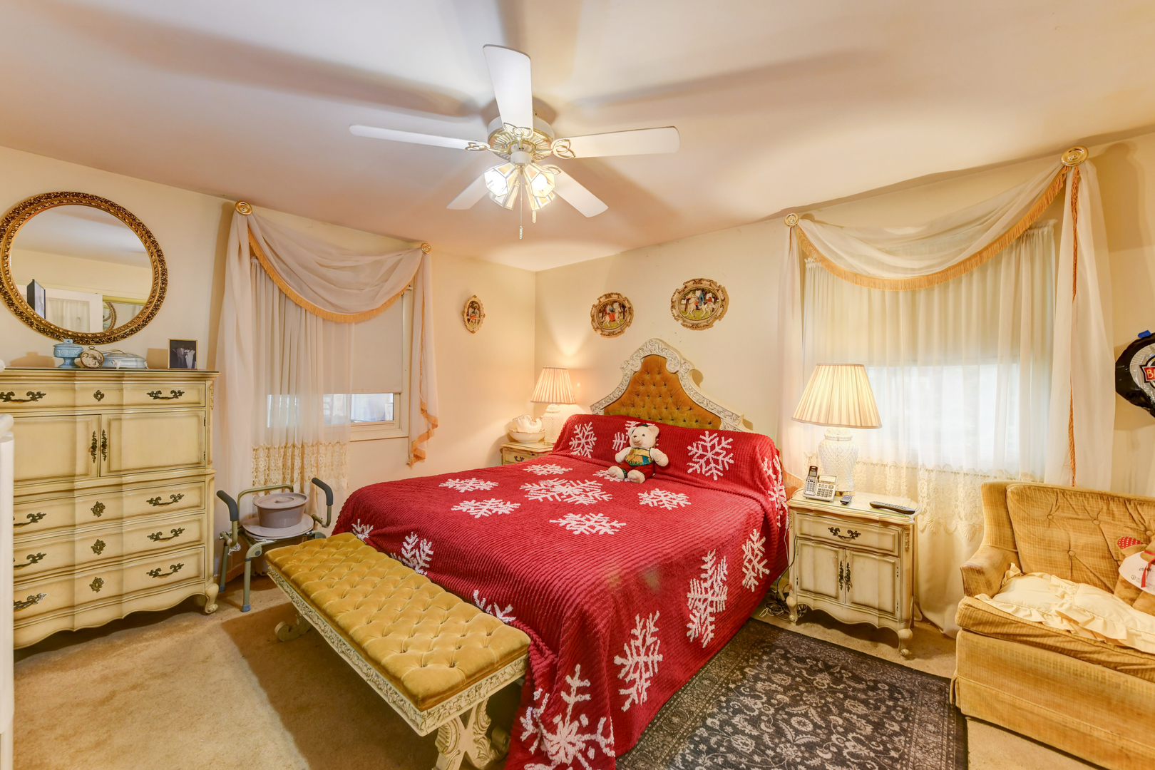 126 Denell Drive Crete, IL 60417 - Photo 16 of 30 a bedroom with a bed a chandelier and dresser
