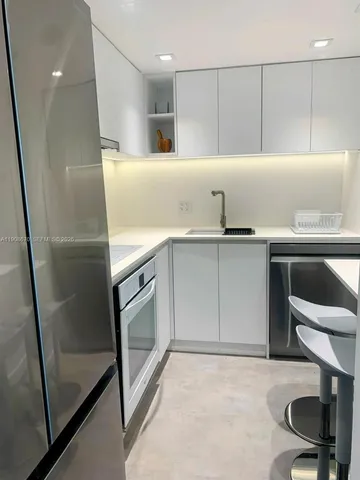 a bathroom with a sink and toilet