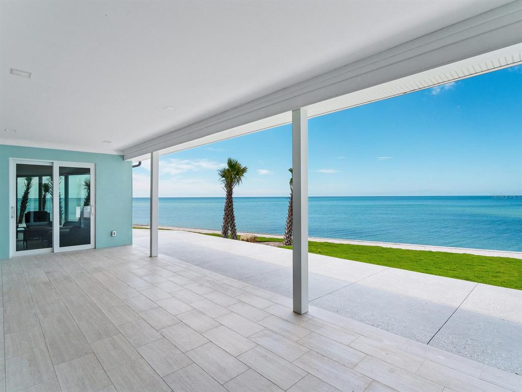 790 North Manasota Key Road Englewood, FL 34223 - Photo 13 of 80 a view of an empty room with a window