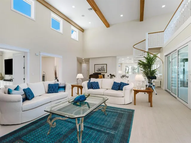 a kitchen with granite countertop a sink and a stove top oven