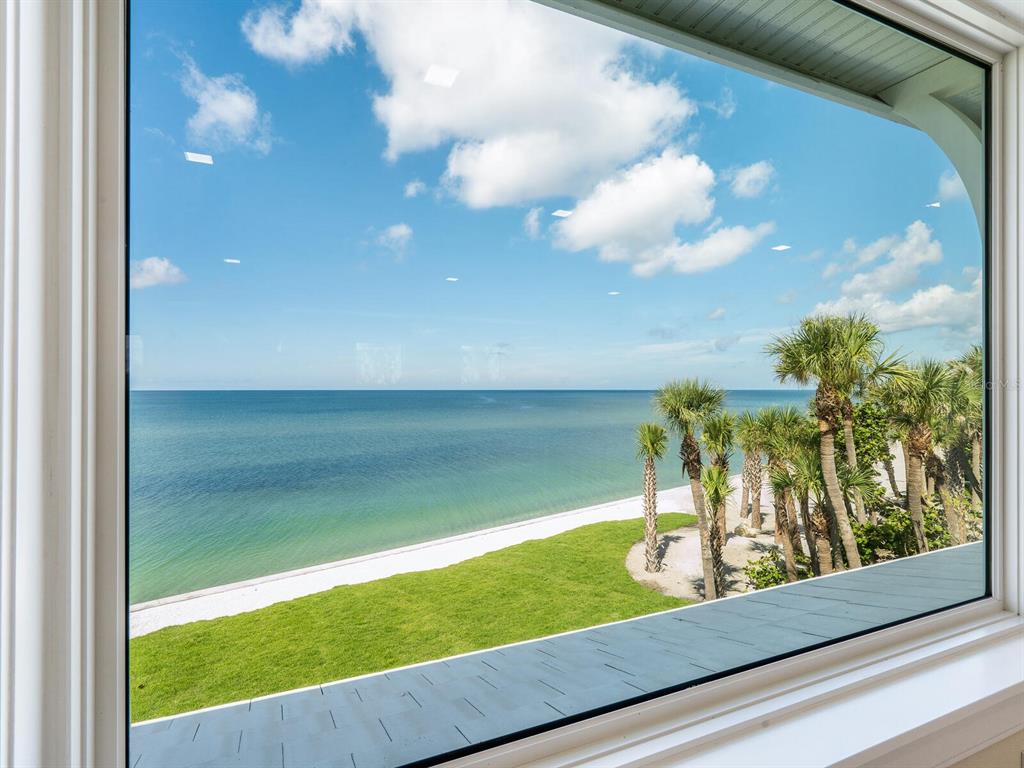 790 North Manasota Key Road Englewood, FL 34223 - Photo 23 of 80 a view of a garden from a window