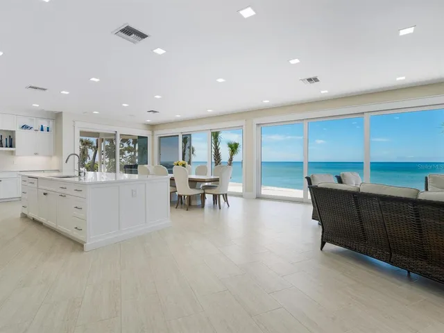 a spacious bedroom with a large bed and a window