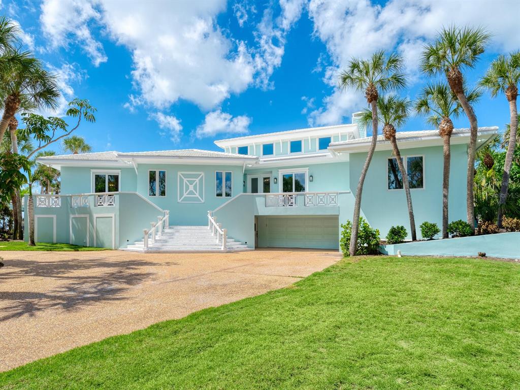 790 North Manasota Key Road Englewood, FL 34223 - Photo 6 of 80 a view of a house with a yard