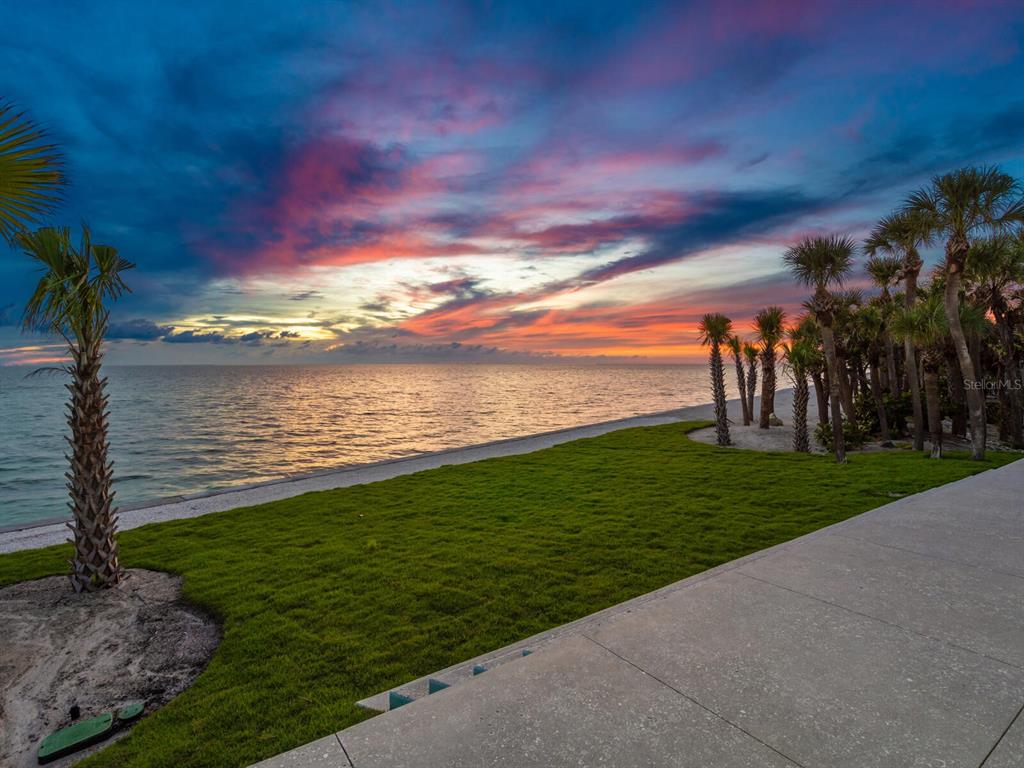 790 North Manasota Key Road Englewood, FL 34223 - Photo 73 of 80 a view of a lake with a big yard