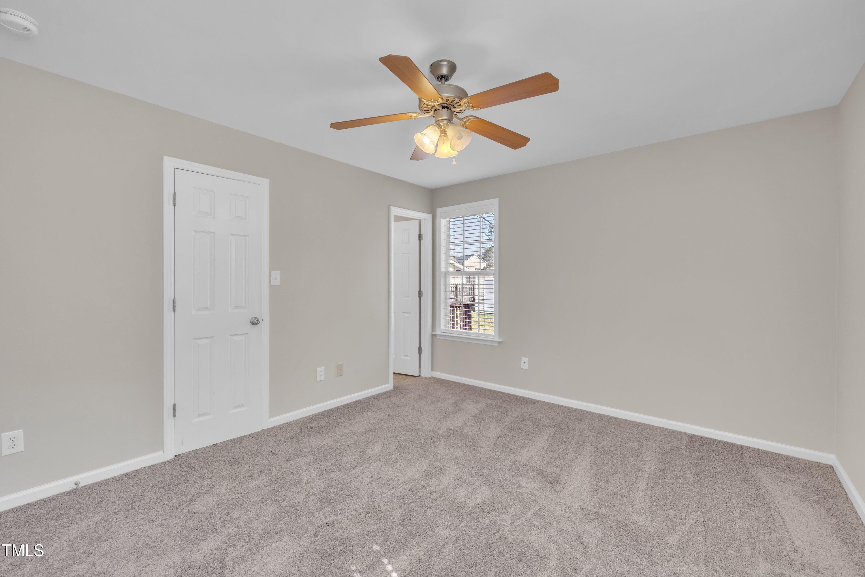 147 Tralee Drive Smithfield, NC 27577 - Photo 12 of 43 a view of a ceiling fan in a room