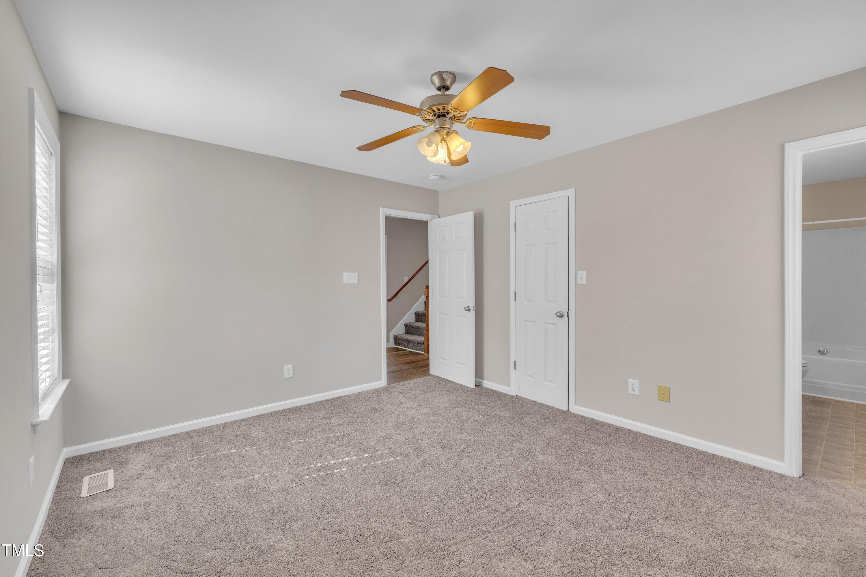 147 Tralee Drive Smithfield, NC 27577 - Photo 13 of 43 a view of an empty room