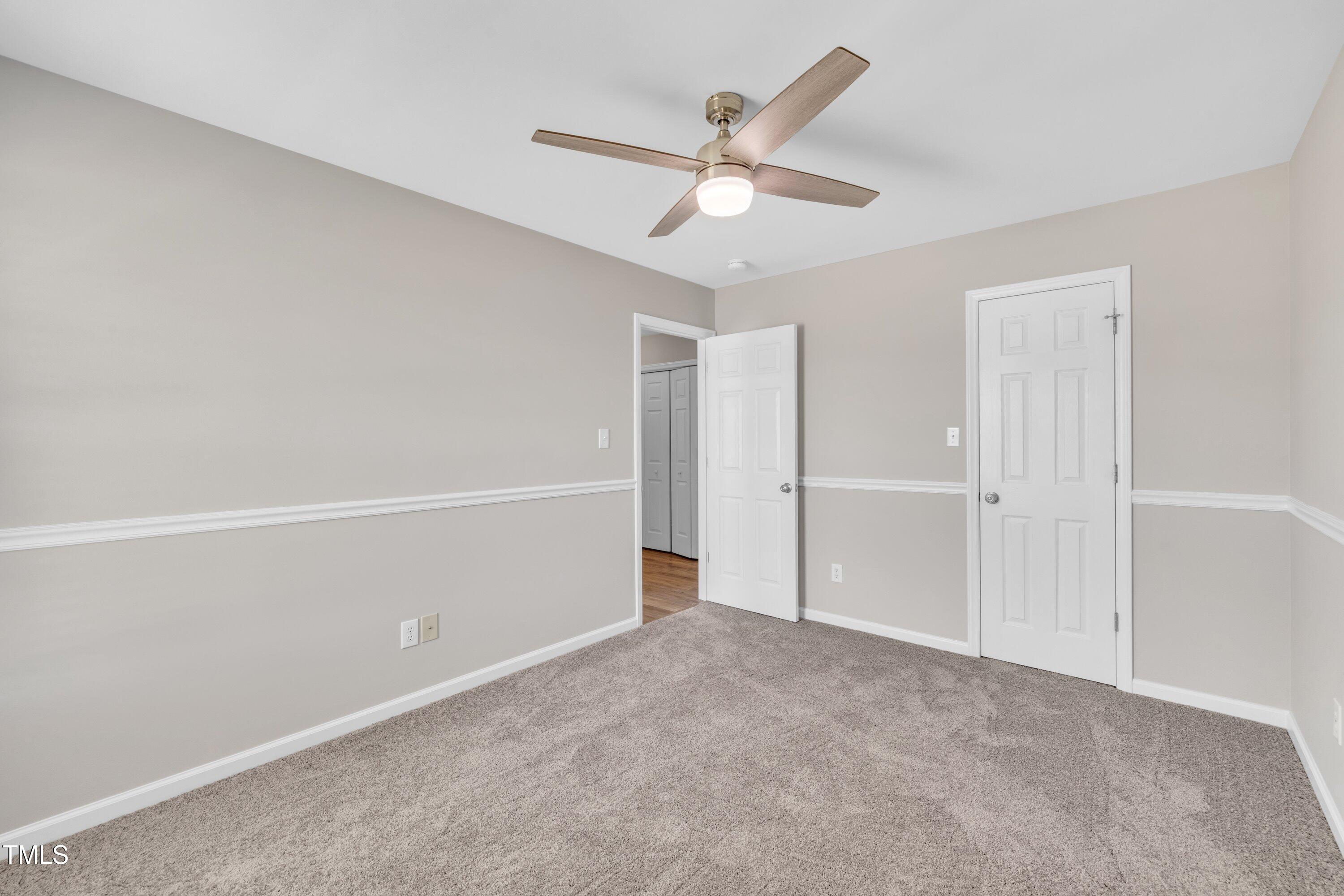 147 Tralee Drive Smithfield, NC 27577 - Photo 18 of 43 a view of an empty room