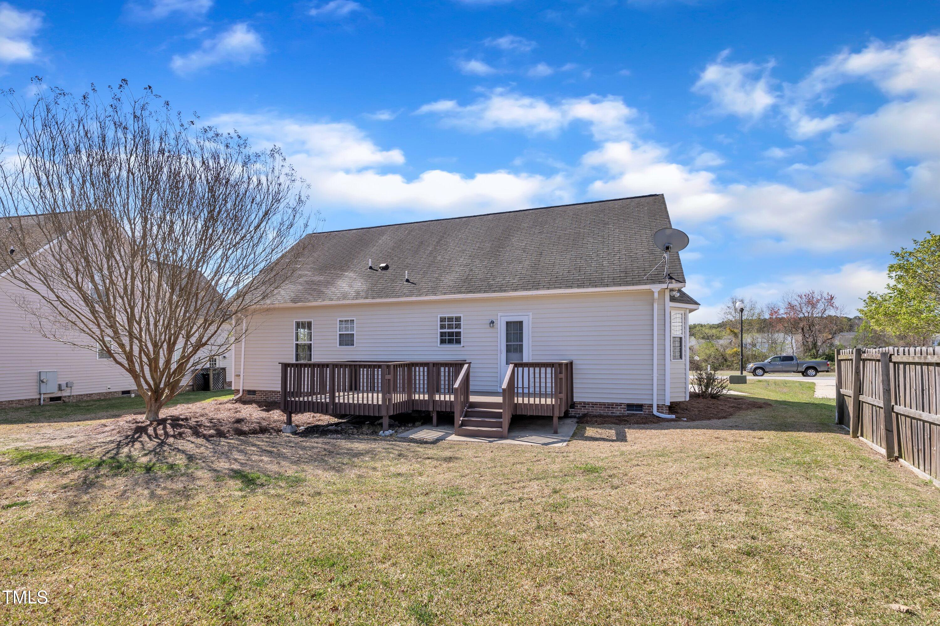 147 Tralee Drive Smithfield, NC 27577 - Photo 36 of 43 a view of a house with a yard covered in snow