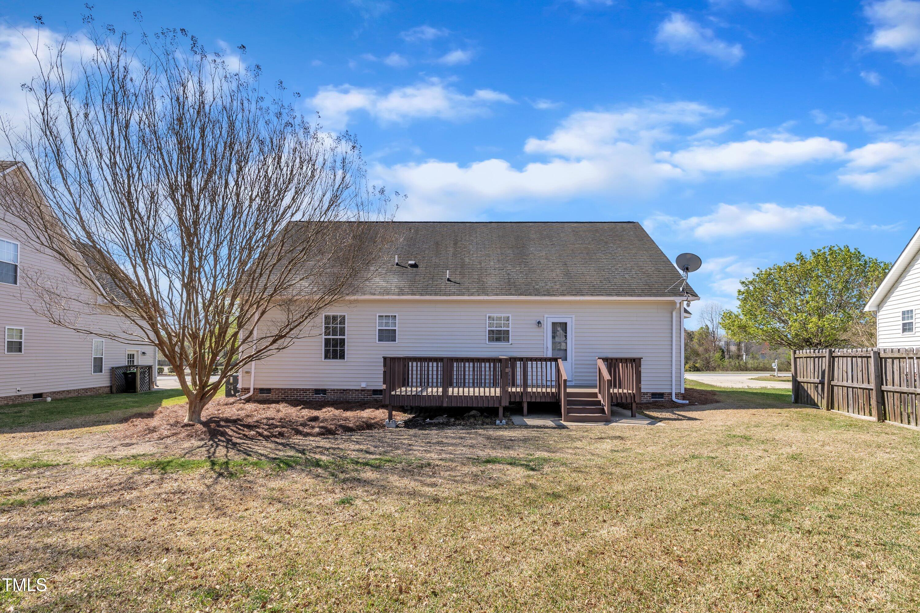147 Tralee Drive Smithfield, NC 27577 - Photo 37 of 43 a view of a house with a yard