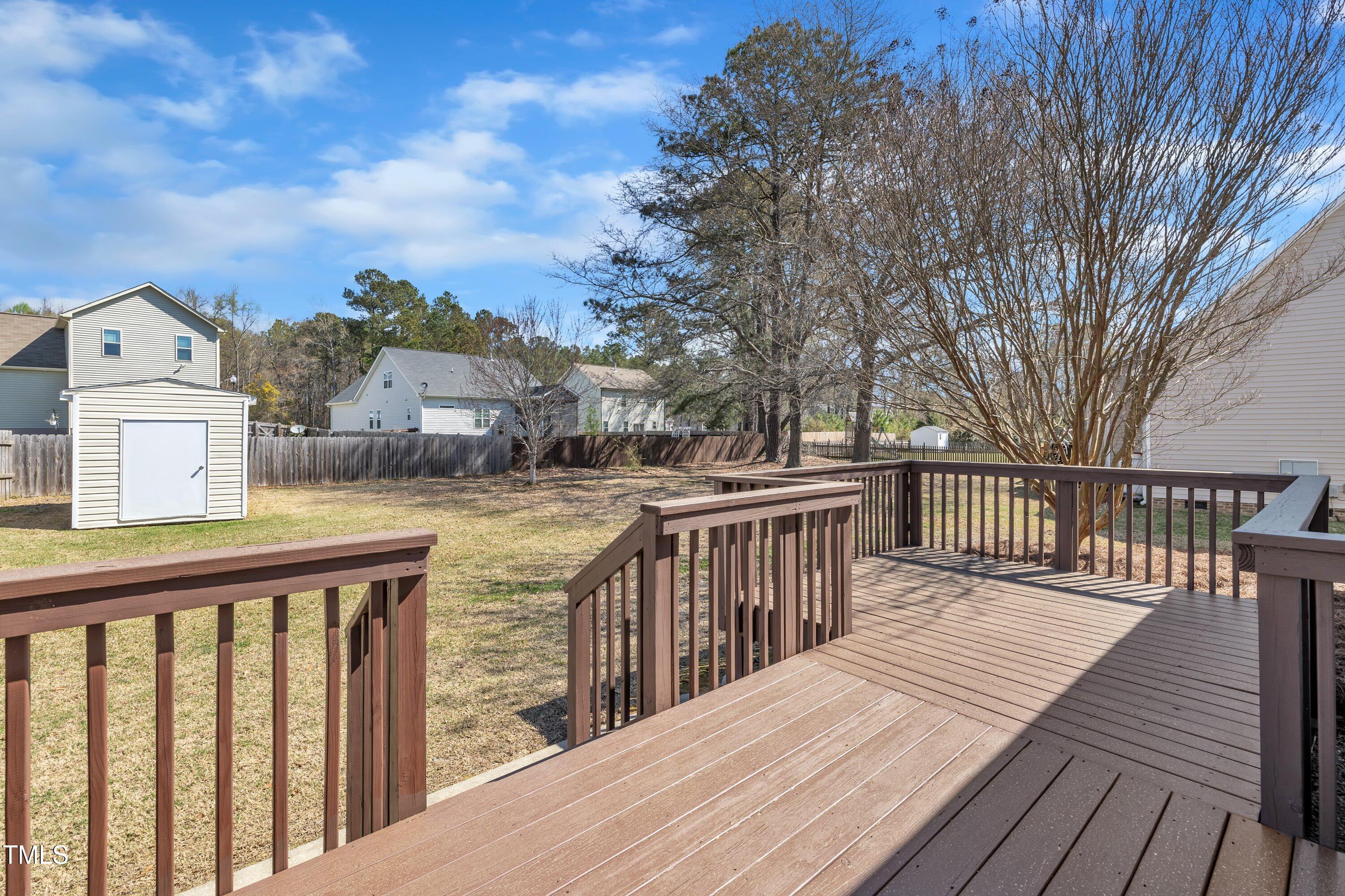 147 Tralee Drive Smithfield, NC 27577 - Photo 40 of 43 a view of a wooden bridge