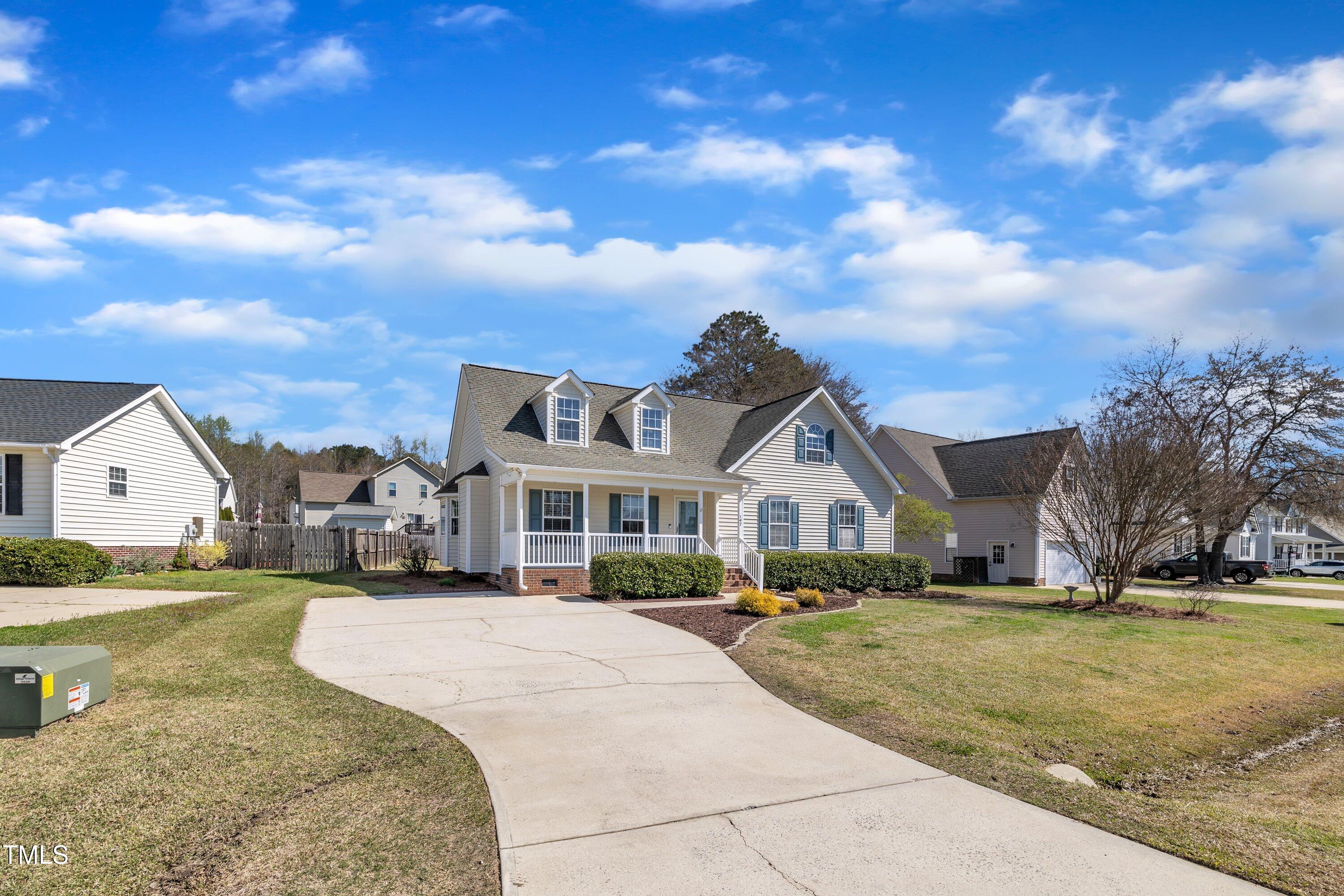 147 Tralee Drive Smithfield, NC 27577 - Photo 4 of 43 a front view of a house with a yard