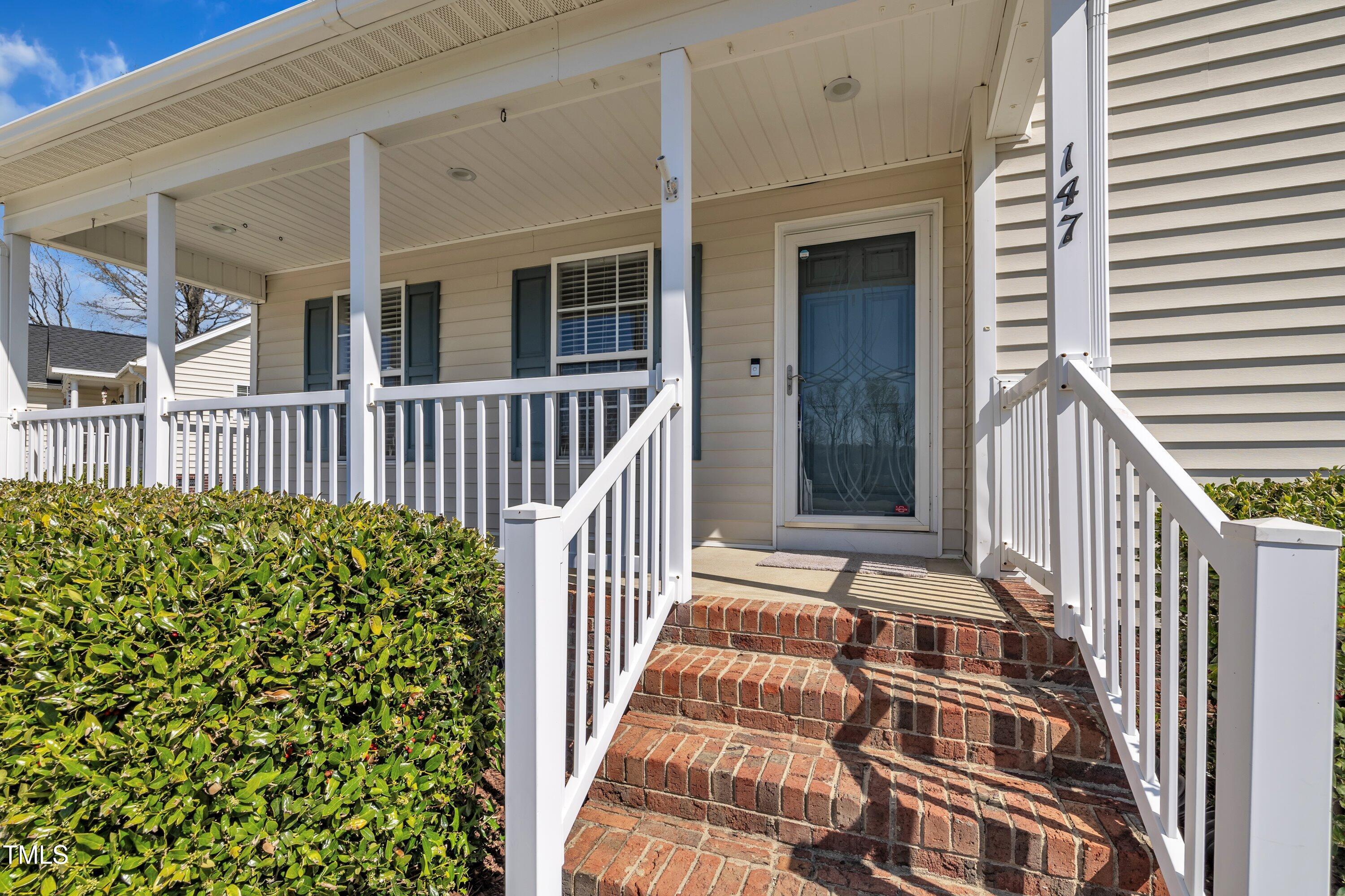 147 Tralee Drive Smithfield, NC 27577 - Photo 5 of 43 a view of a house with a porch