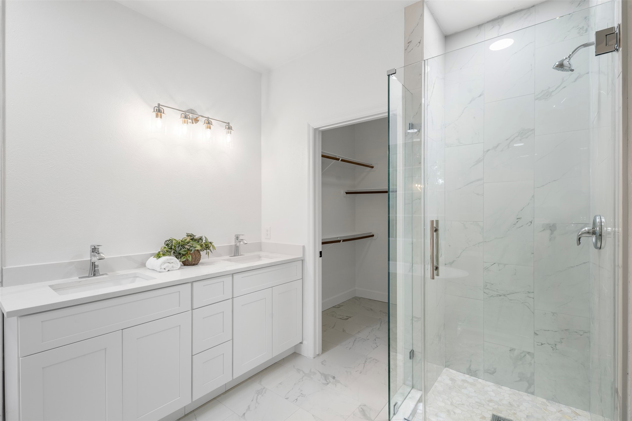 55 Terraglen Drive Spring, TX 77382 - Photo 17 of 32 a spacious bathroom with a shower sink and mirror