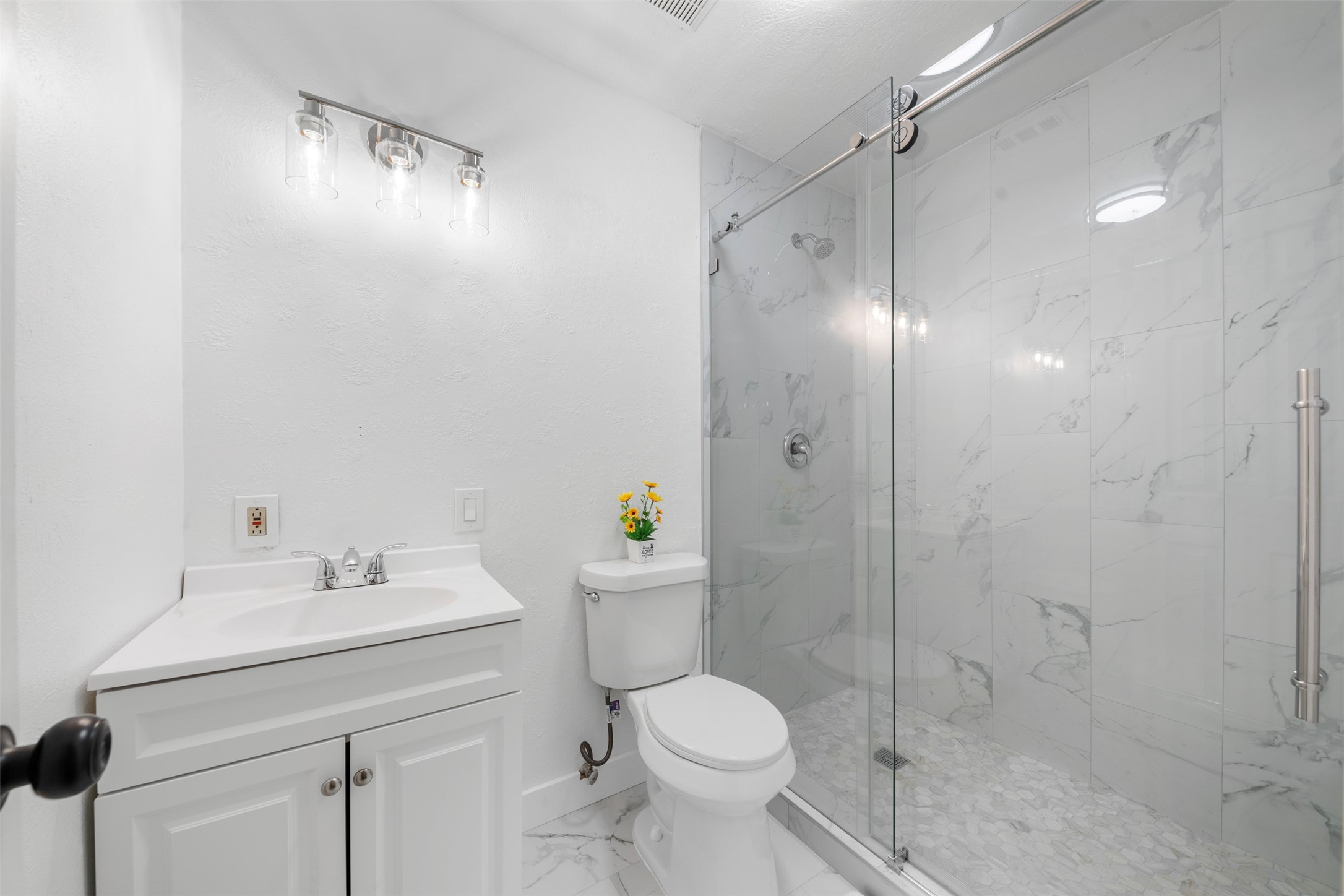 55 Terraglen Drive Spring, TX 77382 - Photo 20 of 32 a bathroom with a sink toilet and shower