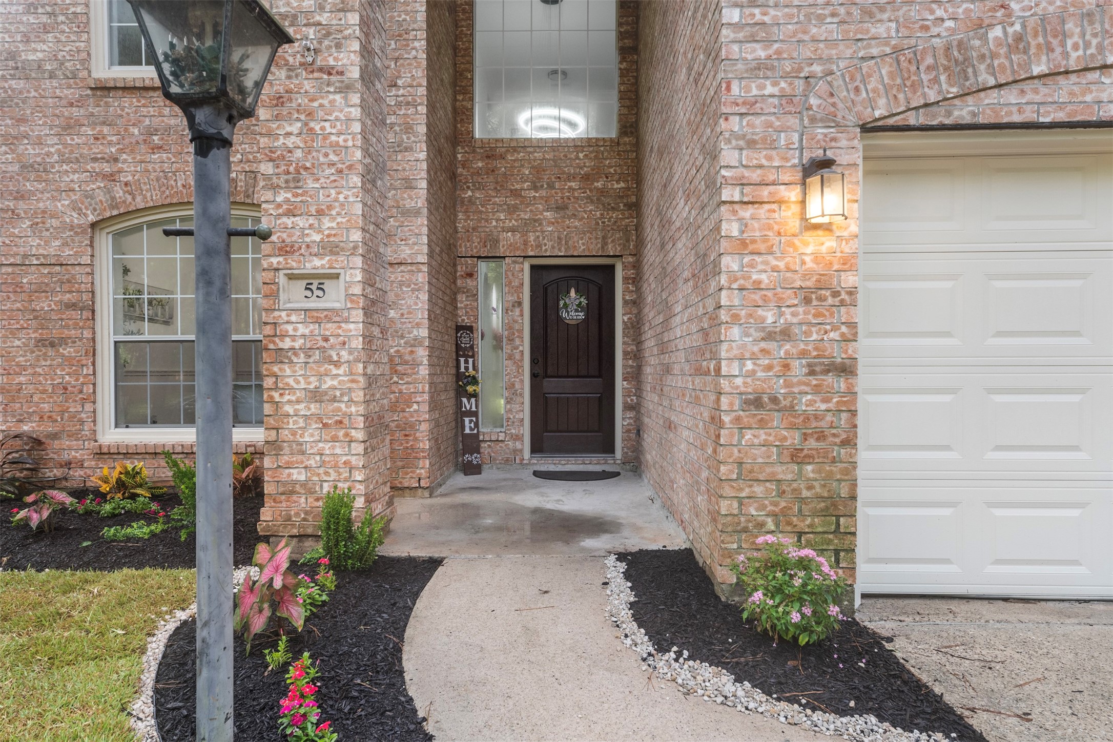 55 Terraglen Drive Spring, TX 77382 - Photo 2 of 32 a front view of a house with potted plants