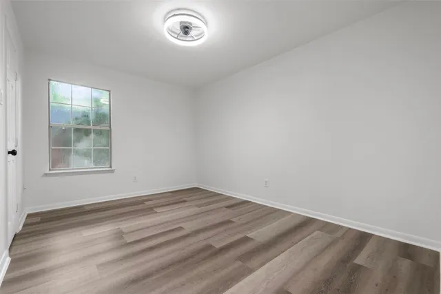 a view of a room with a large window