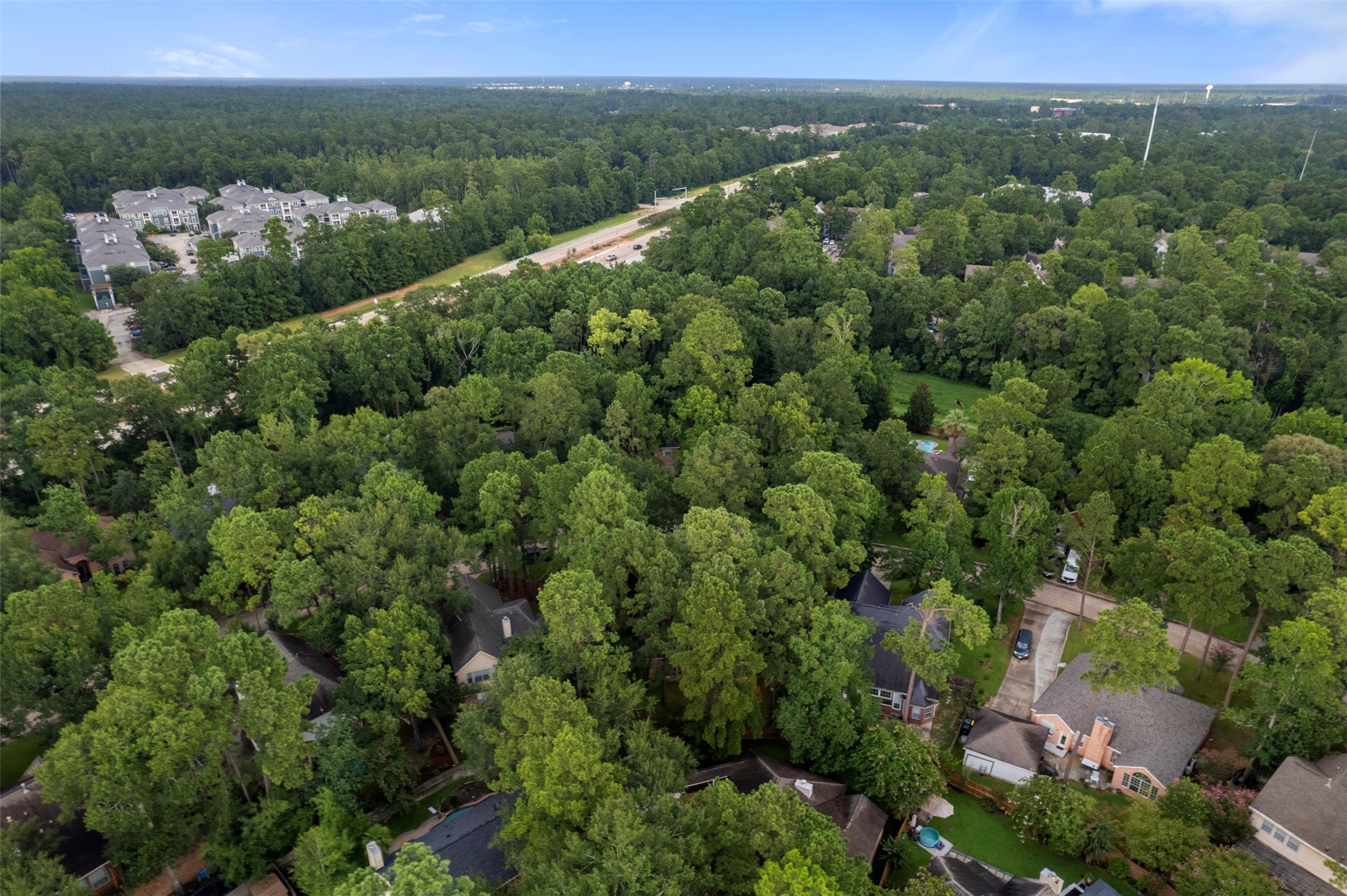55 Terraglen Drive Spring, TX 77382 - Photo 30 of 32 an aerial view of a city with lots of residential buildings