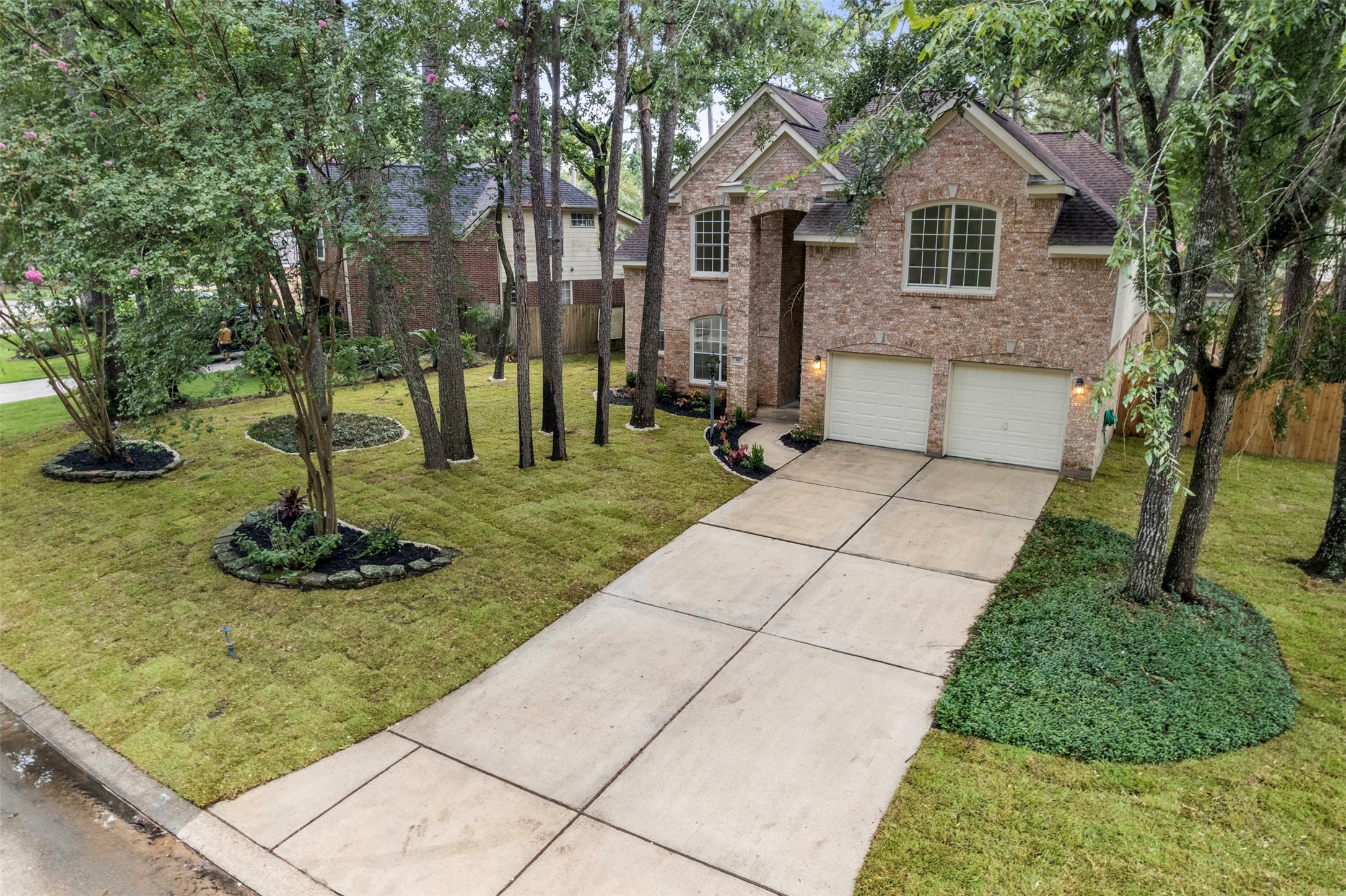55 Terraglen Drive Spring, TX 77382 - Photo 32 of 32 a front view of a house with garden