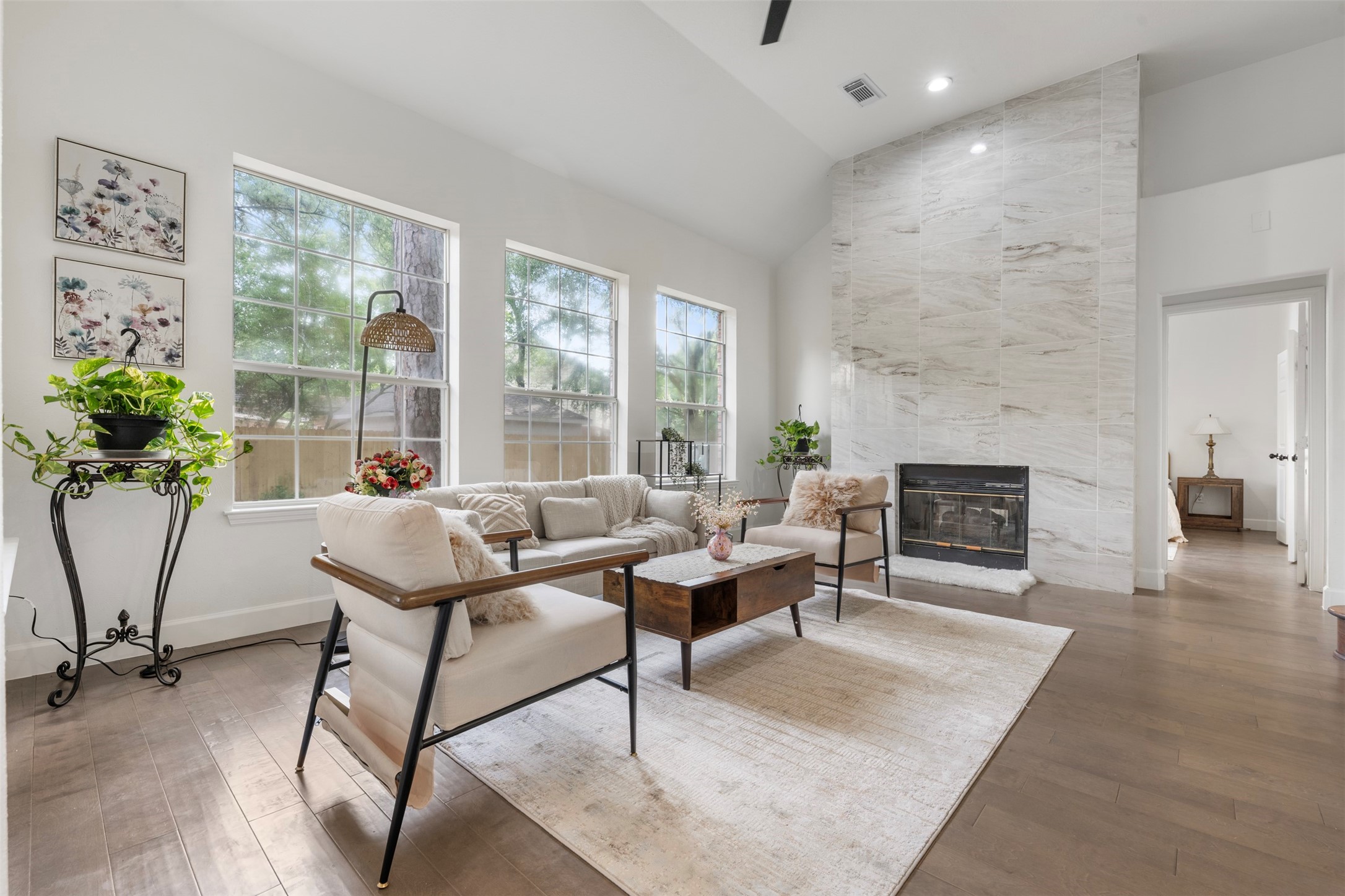 55 Terraglen Drive Spring, TX 77382 - Photo 6 of 32 a living room with furniture a window and a fireplace